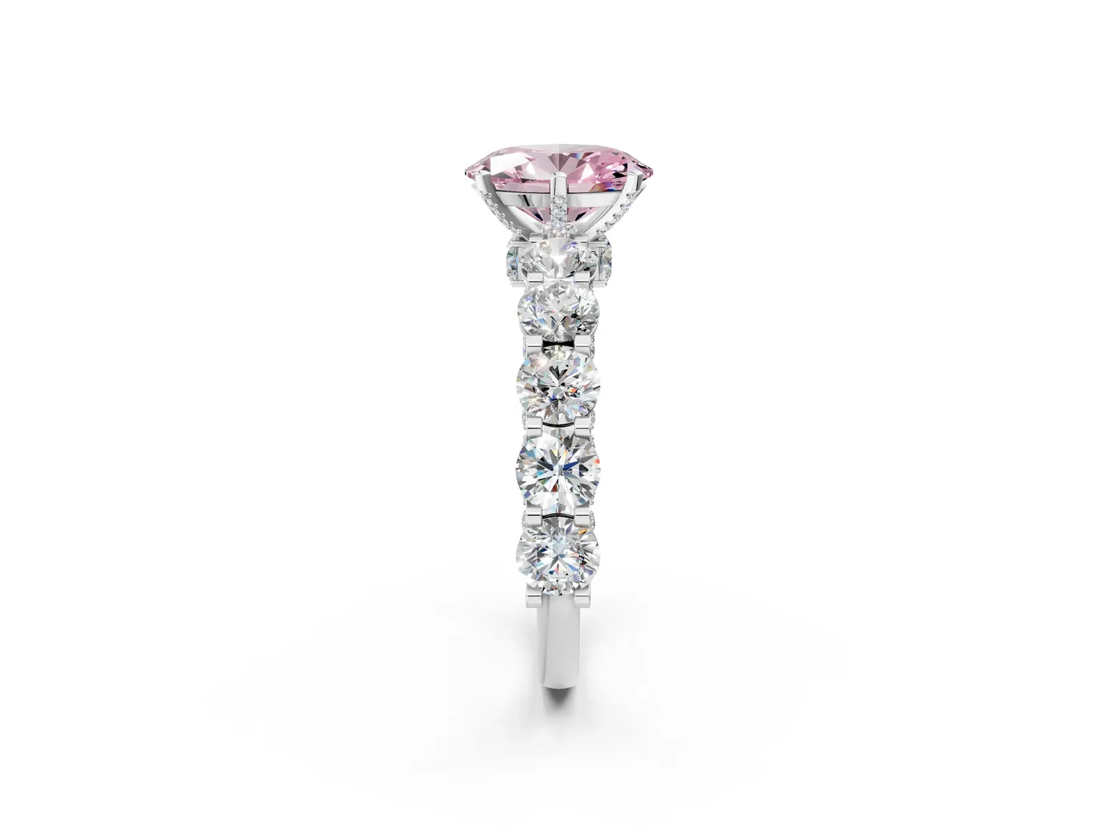 Fancy Pink Oval Cut Diamond Side Stone Engagement Ring with Four-Prong Setting Platinum