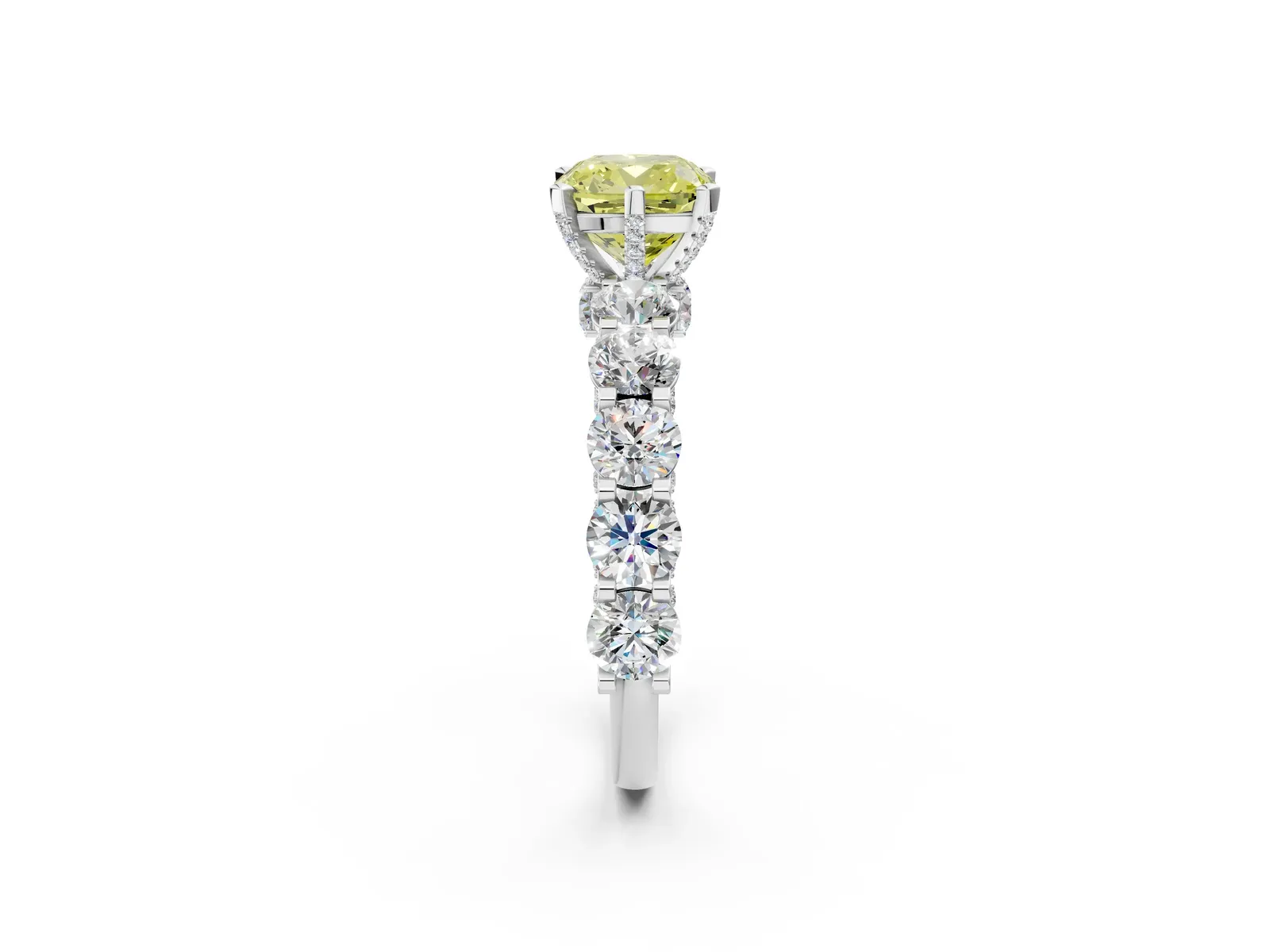 Fancy Yellow Cushion Cut Diamond Side Stone Engagement Ring with Four-Prong Setting Platinum