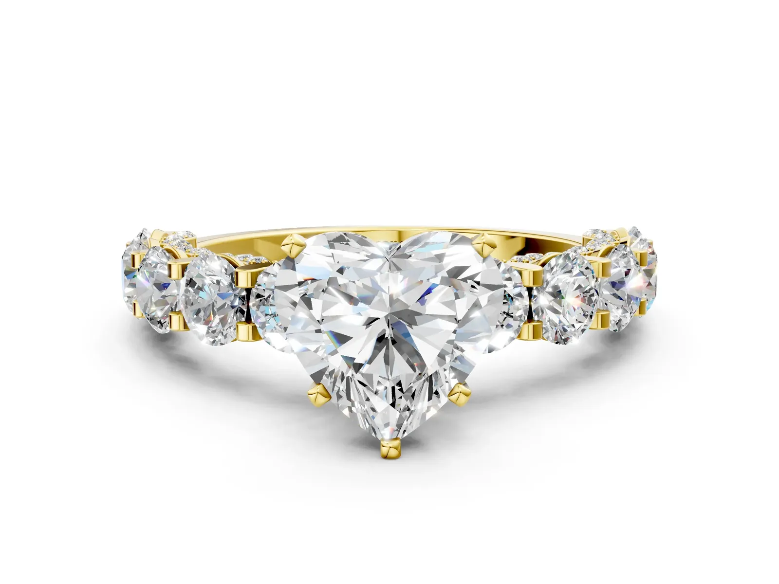 Heart Cut Diamond Side Stone Engagement Ring with Four-Prong Setting Yellow gold