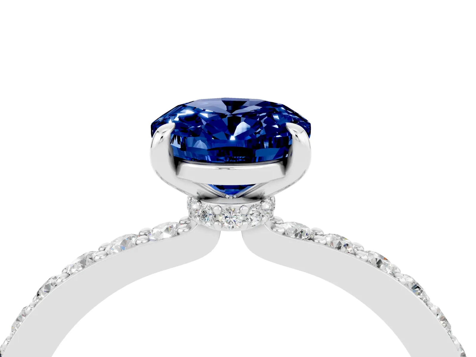 Oval Cut Blue Sapphire Solitaire Engagement Ring with Pavé Band and Four-Prong Setting Platinum